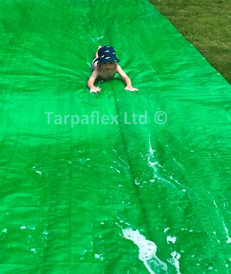 Slippery fun with a tarpaulin by Simon Page, Tarpaflex